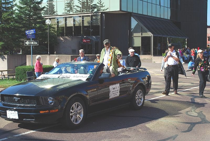 This Years Parade Marshall was an original Parade promoter, Betty Chavis. Behind her walked MTU President Glen Mroz.