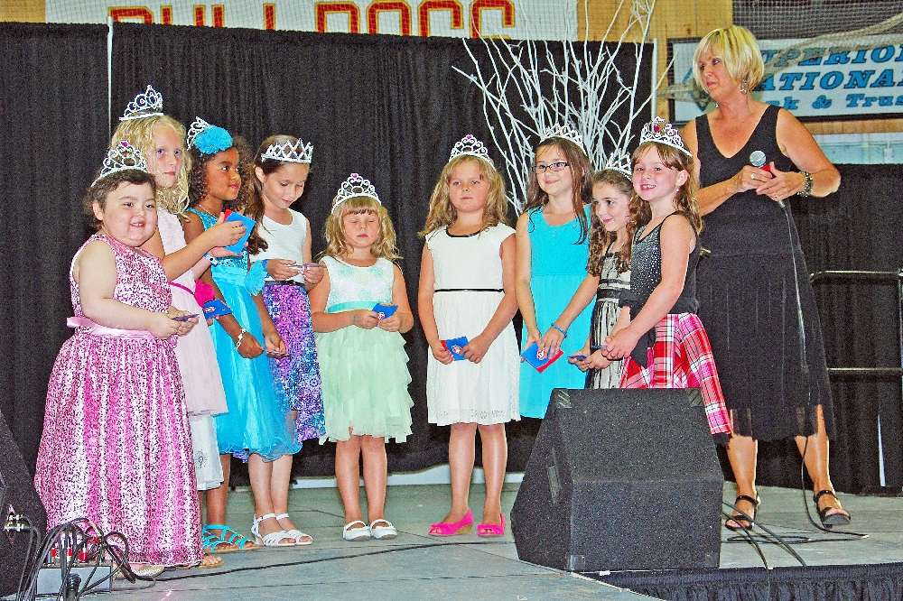 Thursday evening, opening night, always brings the Miss Houghton County Teen Queen contest. This year, seven young ladies vied for the Title. During a lull in the activities while votes were tallied, a Miss Princess show was held on stage, featuring nine younger ladies.
