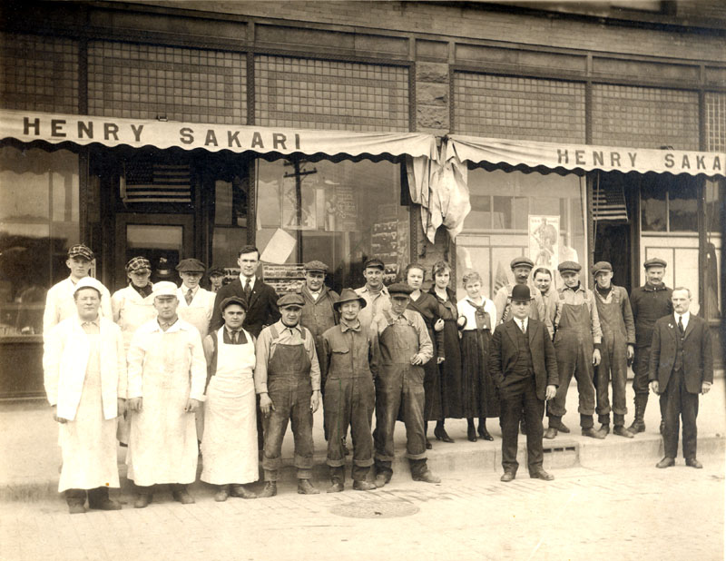 Sakari's Market was located on the NE corner of Quincy St., and S. Lincoln Drive (and is now the Market Apartments), and was a longtime grocery business in the City. These photos, were taken in 1913, and show the staff and employees.